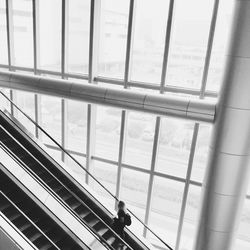 High angle view of person seen through glass window