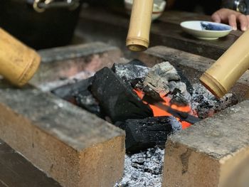 High angle view of fire on wood