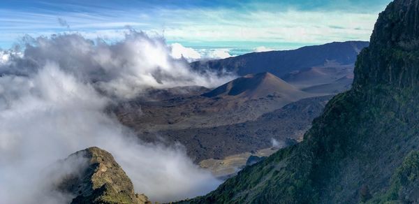 Panoramic view of volcanic landscape against sky