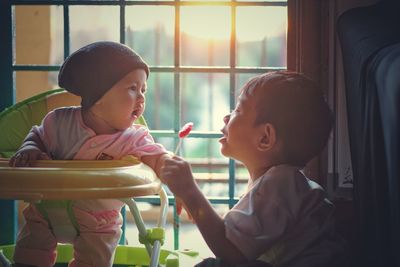 Cute siblings at home