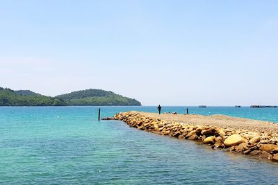 Scenic view of sea against clear sky