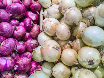 Full frame shot of onions for sale at market stall