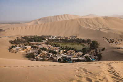Aerial view of huacachina oasis in peru. 