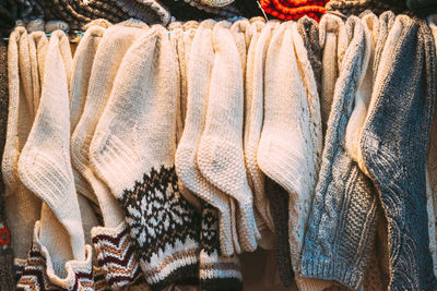 Full frame shot of clothes hanging in store