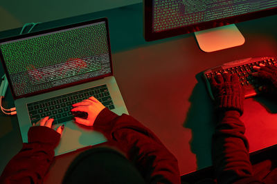 High angle view of woman using laptop