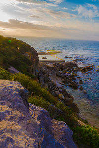 Scenic view of sea against sky during sunset