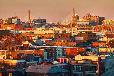 High angle view of buildings in city of boston during sunrise