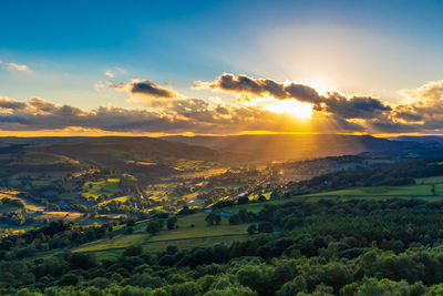 Scenic view of landscape against sky during sunset