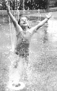 Girl enjoying in swimming pool