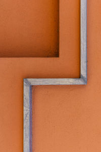 Close-up of orange wall of building