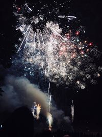 Firework display at night