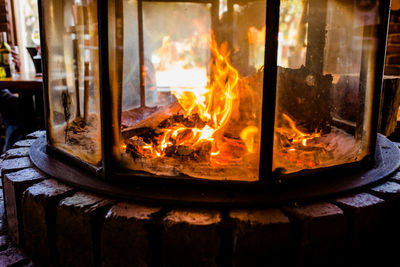 Close-up of fire burning in window