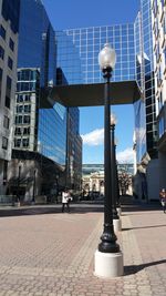 View of buildings against blue sky