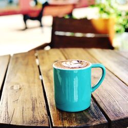 Close-up of coffee cup on table