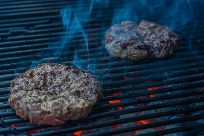 Close-up of meat on barbecue grill