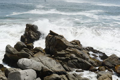 Scenic view of rocks on beach