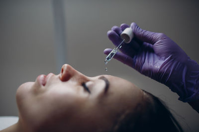 Close-up of woman having beauty treatment at spa