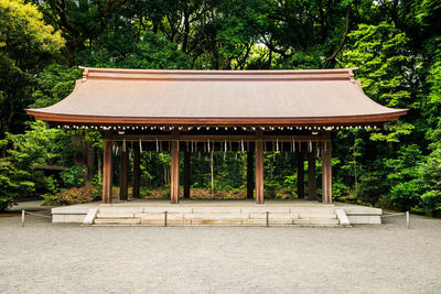 Gazebo in park against building