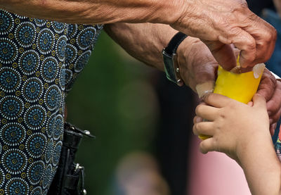 Close-up of man holding hands