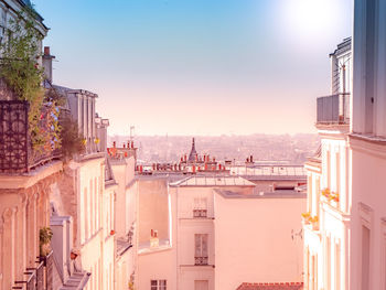 Panoramic view of buildings in city against clear sky