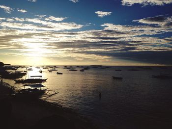 Scenic view of sea against sky at sunset