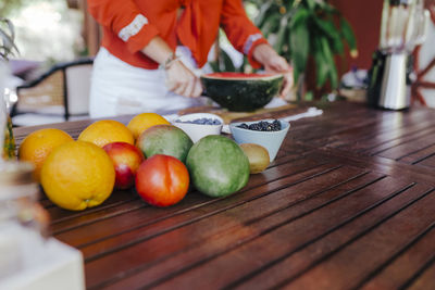 Fruits in basket on table