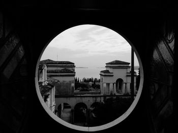 Buildings seen through arch