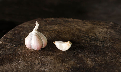 Close-up of garlic on table