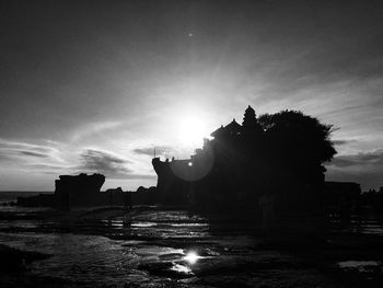 Silhouette of people on beach