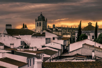 High angle view of buildings against sky at sunset