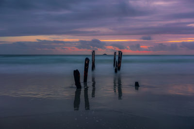 Scenic view of sea against sky at sunset