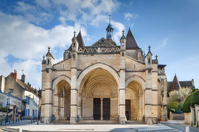 Facade of historic building against sky