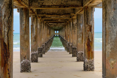 View of wooden pier on beach