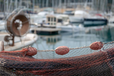 Fishing boats moored at harbor