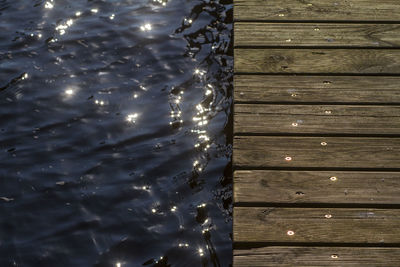 Close-up of wood against water