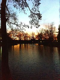 Scenic view of lake at sunset