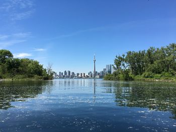 View of lake against blue sky