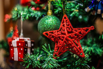 Close-up of christmas decoration hanging on tree