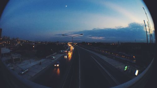 High angle view of light trails on road at night