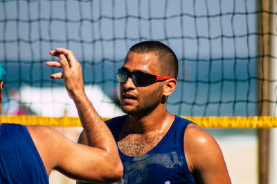 Portrait of young man wearing sunglasses