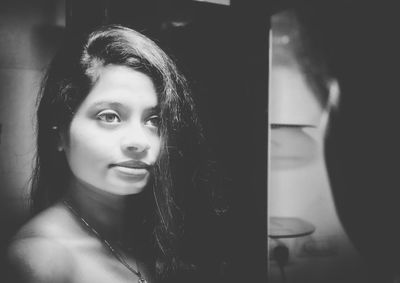 Close-up portrait of young woman