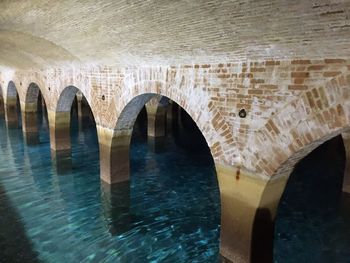 Arch bridge over sea