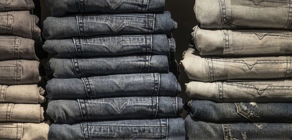 Closeup shot of stack of folded jeans