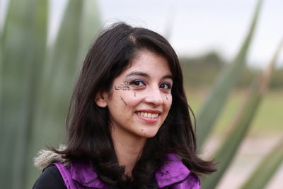 Portrait of a smiling young woman