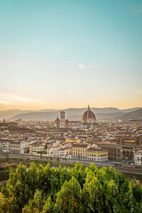 View of cityscape at sunset