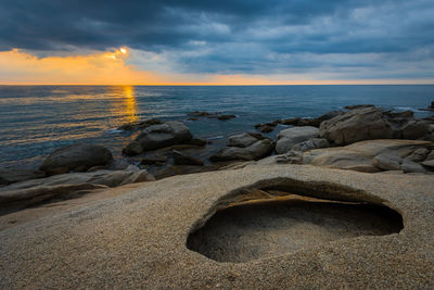 Scenic view of sea against sky during sunset