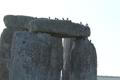 Low angle view of stone against clear sky