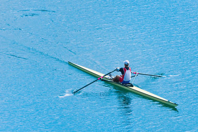 High angle view of people on boat in water