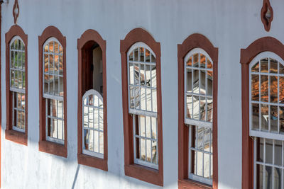 Reflection of building on glass window