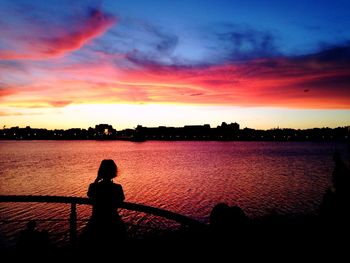 Silhouette of people at sunset